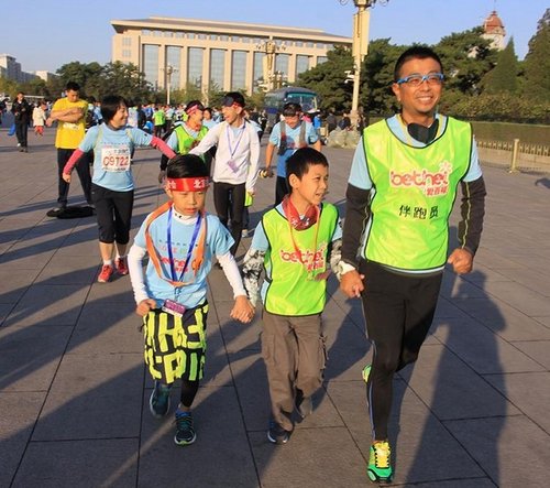 北京马拉松 让体育和公益“跑 在一起”