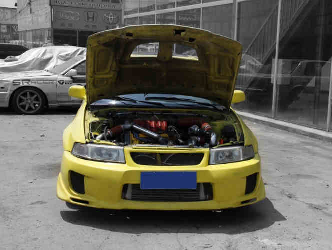 改装简介: 这辆黄色东南菱帅改装了,hks涡轮套件,recaro座椅,momo